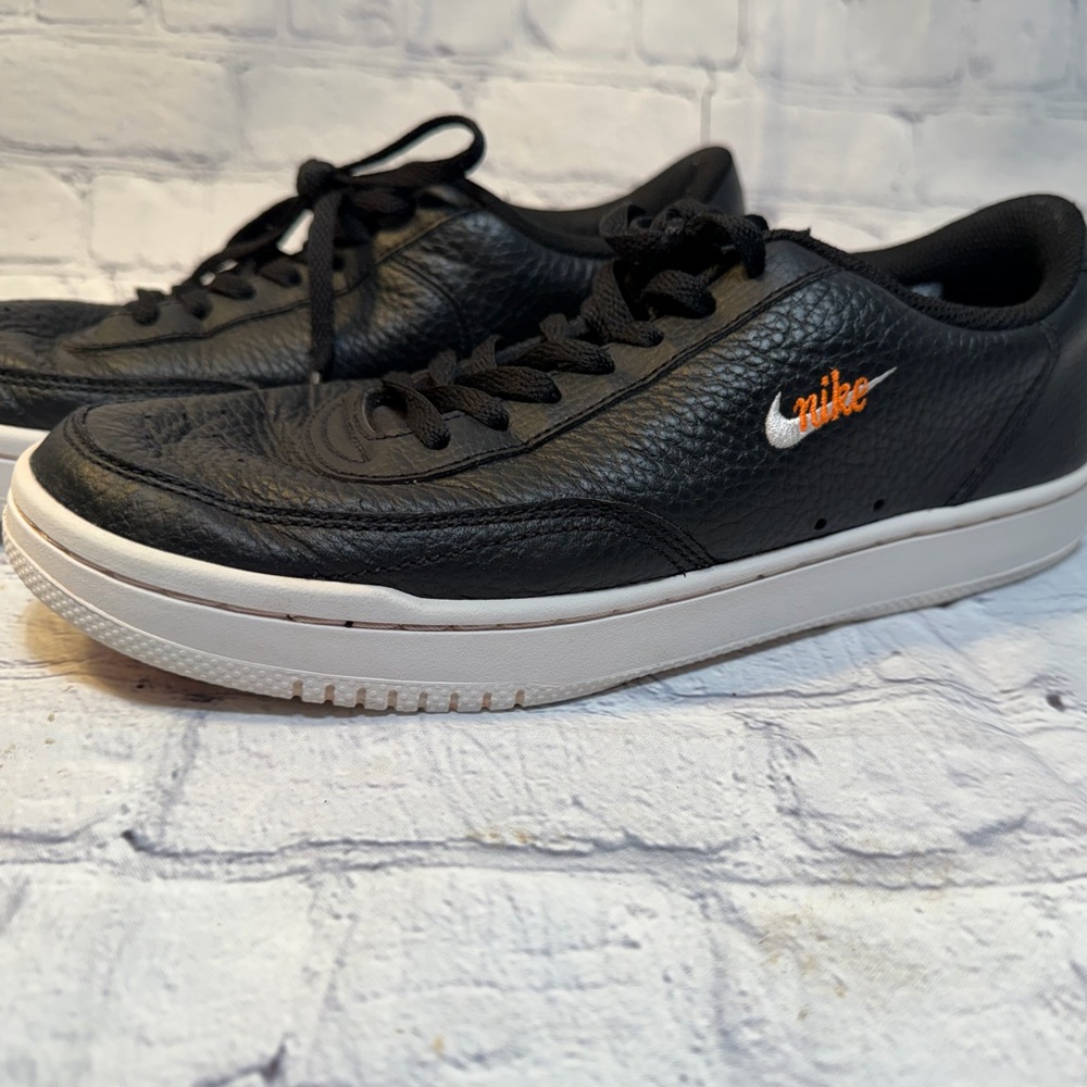Nike Black and White Sneakers with Orange Detail
